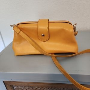 Woman's yellow leather purse